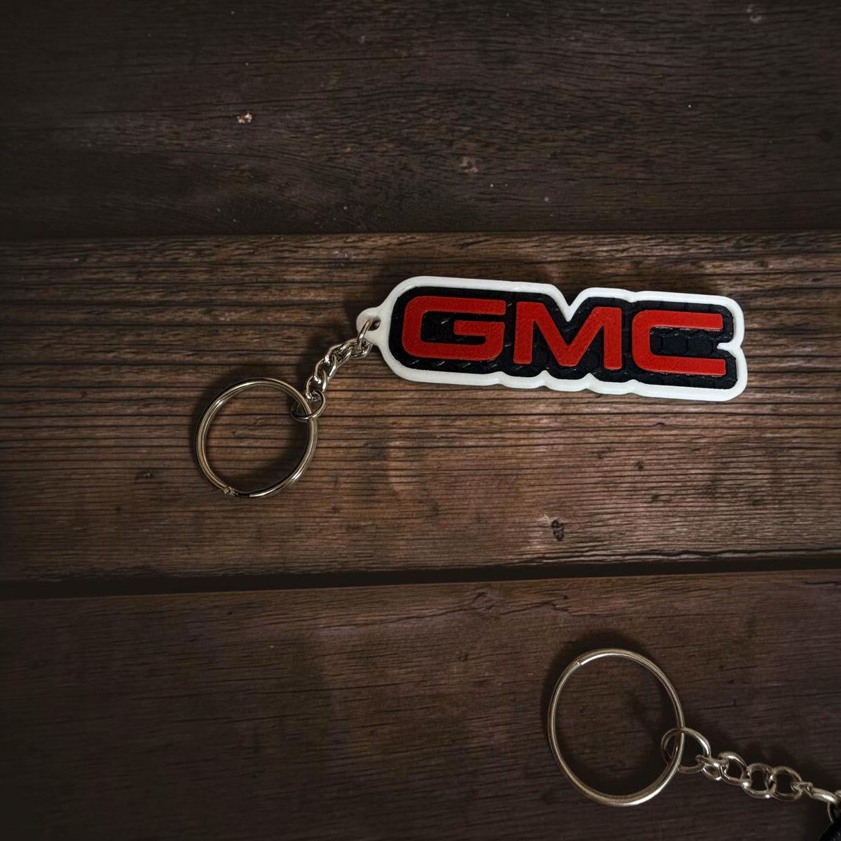 White outlined keyring